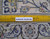 Back of the rug beside a ruler, showing knot density and authentic handmade construction