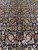 Detail of mahi fish pattern rosettes and curved leaves on midnight navy wool field