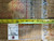 Back of the rug with tape measure and tag reading rug number 5931, size 12.3 x 18