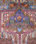 Close view of the central panel, blue domed pavilion with cypresses, hills and orange lions above