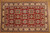 Top down view of the 10'2" x 16' Kazak rug, symmetrical panel grid on brick red ground