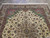 8x9 Persian Tabriz rug upper half showing floral medallion, arabesque vines and cream fringe
