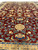 Angled view of one end of the field, gold palmettes and teal leaves on red