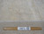 Ruler with 100% handmade label beside fringe, showing cotton foundation and 3/8 inch wool pile