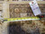 Back of rug with tape measure and hand woven Oriental rug tag number 5347