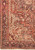 8'6" x 11' Heriz rug corner with ivory spandrel, navy border and tightly woven selvedge