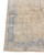 Corner detail showing denim blue floral border, guard stripes and ivory fringe of the wool rug