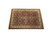 Angled studio view of the 10' x 14' hand-knotted wool and silk rug showing ivory borders