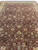 10' x 14' Oriental area rug photographed lengthwise, showing symmetrical all over drawing and ivory borders
