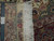 Reverse side with ruler and Authentic Hand Knotted tag showing tight knot density and cotton warps