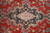 Detail of the ivory and rose central medallion set in a navy cartouche with leaf scrolls