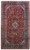 10 x 17 red Persian Kashan rug shown flat, navy floral border framing a central medallion