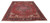 10'5" x 13' Heriz rug photographed at an angle showing the geometric field and dark border