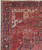 Corner detail showing ivory spandrel, navy main border rosettes and selvedge on Persian Heriz rug