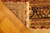 Folded corner of the 8'9 x 12'3 silk rug revealing dense weave and tight selvage