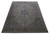 Angled floor view of a large cream and blue hand-knotted Kashan rug for a living room