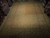 Full overhead shot of the 12' x 17'9" Ziegler rug, neutral wheat brown palace size piece