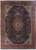 Oversize 11x16 Persian Tabriz rug with navy paisley field, salmon medallion and brick red floral border