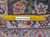 Reverse side with ruler and Authentic Handmade label showing tight hand-knotted wool knot rows