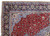 Corner close-up of navy border with ivory palmettes, sage rosettes and pastel blue guard stripes