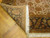 Folded corner showing tight hand-knotted wool weave, cotton foundation and hand-tied ivory fringe