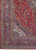 Corner detail showing navy main border, ivory spandrel and dense floral vinework in fine wool