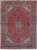 9'10" x 13'4" Persian Kashan rug with deep red floral field and navy border