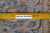 9x12 Persian Kashan rug back showing dense hand-knotted wool weave measured against a yellow ruler