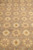 Detail of the all-over floral lattice repeat in cream, apricot and dusty rose tones