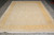 9' x 11'6" Indian rug photographed flat on grey tile showing the all over floral field