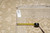 Back tag marked 9 x 11.6 beside a tape measure verifying the rug size