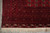 Corner of the Pakistani Bokhara rug with ivory comb elem panel and flat kilim end