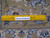 Back of this 9x13 Persian rug with ruler showing knot density and authentic handmade weave