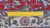 Back of 9'9" x 12'11" Tabriz rug with ruler showing wool knot density