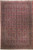 Overhead view of maroon Persian rug with all-over floral lattice and deep navy floral border