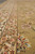 Border and field meeting with salmon vine work and multicolored palmettes in close detail
