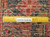 Ruler placed on wool pile showing knots per square inch of authentic handmade Heriz weave