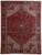 Deep red Persian Heriz rug 9x12 with black geometric medallion and ivory corner spandrels