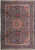 Navy blue Persian Tabriz rug with salmon medallion and dense ivory vine scroll, overhead view