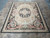 Full overhead photograph of the rug, edges straight, borders and field evenly lit