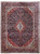 10'3" x 13'7" Persian Kashan rug with navy blue field and red central medallion