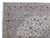Corner detail of blush main border, ivory guard stripes and navy vine work on Kashan