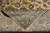 Folded corner revealing the cotton foundation and tight knot count of this Persian Kashan