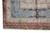 Corner detail with sky blue main border, navy cartouches and slim burgundy guard stripe above fringe
