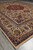 Full angled view of the 9'6" x 13'2" Tabriz rug showing borders, vase motif and medallion