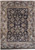 Midnight blue Jaipur rug with allover floral palmettes and ivory multi-panel border, full overhead view