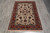 3'6" x 5'4" Persian Isfahan rug on grey stone floor with ivory silk fringe in foreground