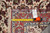 Reverse side with inventory tag reading 3' 6" x 5' 4" and tape measure across knot rows