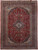 Full overhead view of 10' x 13'4" Persian Kashan rug with red field and indigo medallion