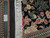Ruler on the back confirms hand-knotted wool construction, cotton foundation and natural white fringe tassels